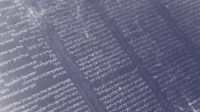 Open page of a handwritten Hebrew scripture with columns of text